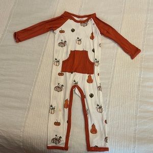 Kyte baby pumpkin longall; worn - good condition; one small stain (pictured)